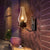 One Bulb Wall Light with Vase Shade Amber Glass Rustic Living Room Sconce Lighting Fixture in Rust black Clearhalo 'Cast Iron' 'Glass' 'Industrial wall lights' 'Industrial' 'Middle century wall lights' 'Modern' 'Tiffany' 'Traditional wall lights' 'Wall Lamps & Sconces' 'Wall Lights' Lighting' 143352