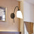 1 Bulb Angle Shade Wall Mounted Light Fixture Modern Black/Gold Milky Glass Lighting for Bedroom Black Clearhalo 'Cast Iron' 'Glass' 'Industrial wall lights' 'Industrial' 'Middle century wall lights' 'Modern' 'Tiffany' 'Traditional wall lights' 'Wall Lamps & Sconces' 'Wall Lights' Lighting' 143398