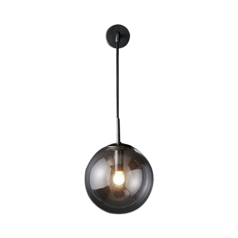 Modern Spherical Wall Lighting Fixture 1 Bulb Smoked Glass Sconce Light in Black/Brass for Living Room, 8"/10" Clearhalo 'Cast Iron' 'Glass' 'Industrial wall lights' 'Industrial' 'Middle century wall lights' 'Modern' 'Tiffany' 'Traditional wall lights' 'Wall Lamps & Sconces' 'Wall Lights' Lighting' 143512
