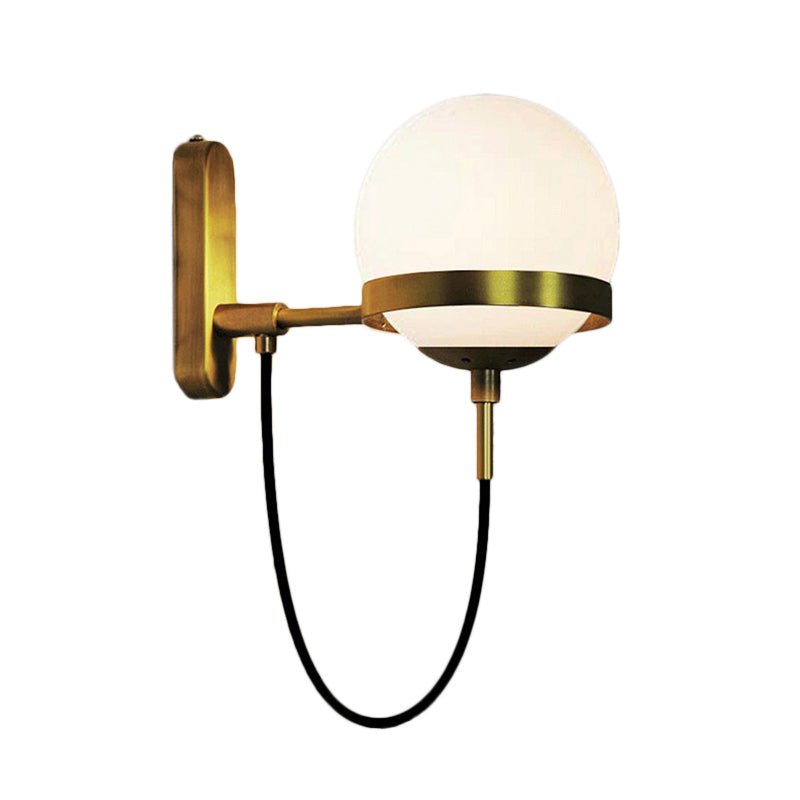 Black/Gold Globe Wall Lighting Modern Clear/Frosted Glass 1 Light Living Room Sconce Light Fixture Clearhalo 'Art deco wall lights' 'Cast Iron' 'Glass' 'Industrial wall lights' 'Industrial' 'Middle century wall lights' 'Modern' 'Rustic wall lights' 'Tiffany' 'Traditional wall lights' 'Wall Lamps & Sconces' 'Wall Lights' Lighting' 143606