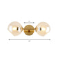 Modernist 2 Lights Wall Lamp with Clear Glass Shade Gold Spherical Wall Mount Light Fixture Clearhalo 'Cast Iron' 'Glass' 'Industrial' 'Modern wall lights' 'Modern' 'Tiffany' 'Traditional wall lights' 'Wall Lamps & Sconces' 'Wall Lights' Lighting' 144631