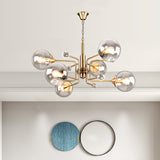 Clear Glass Globe Shade Tiered Drop Lamp Modernist 6 Bulbs Gold Chandelier with Crystal Drape Clearhalo 'Ceiling Lights' 'Chandeliers' 'Clear' 'Industrial' 'Modern Chandeliers' 'Modern' 'Tiffany' 'Traditional Chandeliers' Lighting' 1455174