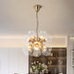 Sputnik Dinette Hanging Chandelier Clear Glass 12 Bulbs Contemporary Ceiling Suspension Lamp in Gold Clearhalo 'Ceiling Lights' 'Chandeliers' 'Clear' 'Industrial' 'Modern Chandeliers' 'Modern' 'Tiffany' 'Traditional Chandeliers' Lighting' 1455249