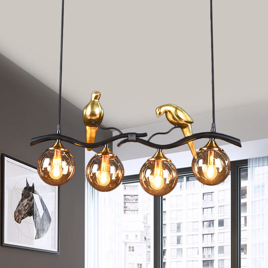 Sprig Island Pendant Light Postmodern Iron 4-Light Black/Gold Hanging Lamp with Amber Ball Glass Shade and Bird Deco Black Clearhalo 'Ceiling Lights' 'Glass shade' 'Glass' 'Island Lights' Lighting' 1456068