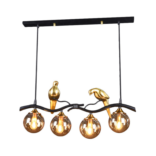 Sprig Island Pendant Light Postmodern Iron 4-Light Black/Gold Hanging Lamp with Amber Ball Glass Shade and Bird Deco Clearhalo 'Ceiling Lights' 'Glass shade' 'Glass' 'Island Lights' Lighting' 1456070