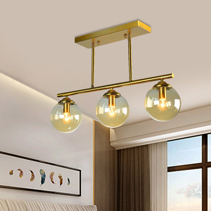 Sphere Clear/Amber Glass Pendant Lamp Vintage 3 Bulbs Gold Hanging Light Fixture over Island Clearhalo 'Ceiling Lights' 'Glass shade' 'Glass' 'Island Lights' 'Pendant Lights' Lighting' 1456074