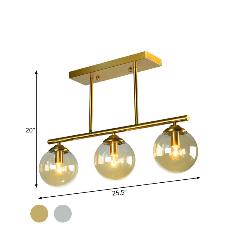 Sphere Clear/Amber Glass Pendant Lamp Vintage 3 Bulbs Gold Hanging Light Fixture over Island Clearhalo 'Ceiling Lights' 'Glass shade' 'Glass' 'Island Lights' 'Pendant Lights' Lighting' 1456076