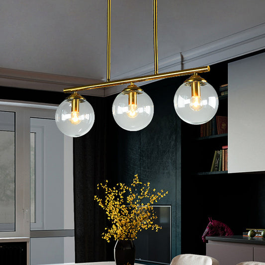Sphere Clear/Amber Glass Pendant Lamp Vintage 3 Bulbs Gold Hanging Light Fixture over Island Clearhalo 'Ceiling Lights' 'Glass shade' 'Glass' 'Island Lights' 'Pendant Lights' Lighting' 1456079