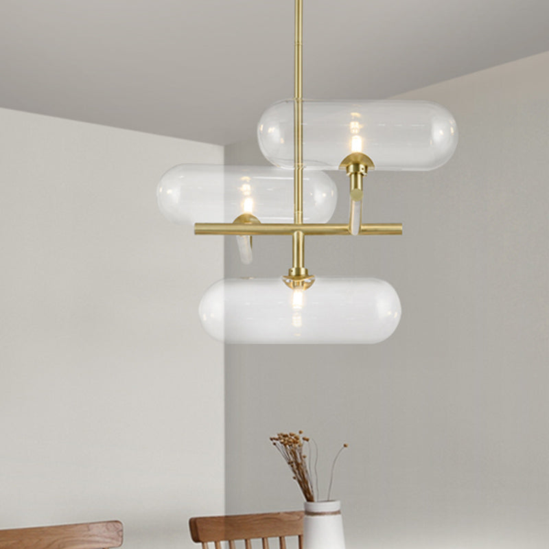 3 Lights Dining Room Ceiling Chandelier Modern Brass Pendant Lighting with Capsule Clear Glass Shade Clear Clearhalo 'Ceiling Lights' 'Chandeliers' 'Clear' 'Industrial' 'Modern Chandeliers' 'Modern' 'Tiffany' 'Traditional Chandeliers' Lighting' 1456107
