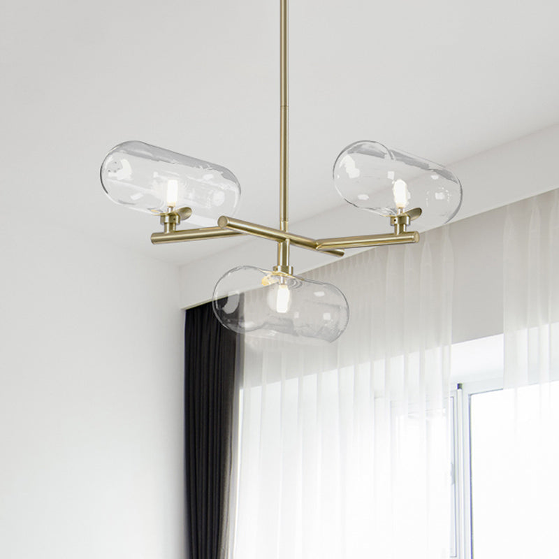 3 Lights Dining Room Ceiling Chandelier Modern Brass Pendant Lighting with Capsule Clear Glass Shade Clearhalo 'Ceiling Lights' 'Chandeliers' 'Clear' 'Industrial' 'Modern Chandeliers' 'Modern' 'Tiffany' 'Traditional Chandeliers' Lighting' 1456108