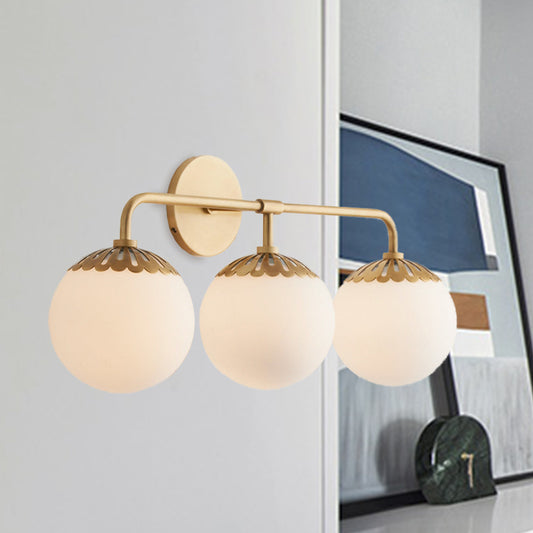 Ivory Glass Gold Vanity Sconce Sphere 2/3 Lights Colonialist Wall Mounted Light Fixture for Bedroom Clearhalo 'Vanity Lights' 'Wall Lights' Lighting' 1456289