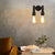 Industrial Bare Bulb Wall Sconce Lighting with Water Pipe 2 Lights Metallic Wall Mounted Lamp in Black/Antique Brass Black Clearhalo 'Art deco wall lights' 'Cast Iron' 'Glass' 'Industrial wall lights' 'Industrial' 'Middle century wall lights' 'Modern' 'Rustic wall lights' 'Tiffany' 'Traditional wall lights' 'Wall Lamps & Sconces' 'Wall Lights' Lighting' 145678