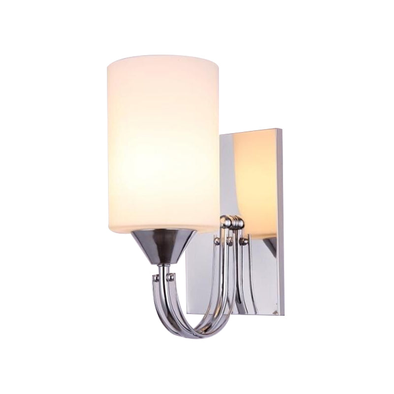 Silver Cylindrical Sconce Lighting Modernist 1 Light White Glass Wall Mounted Lamp with Curved Arm Clearhalo 'Cast Iron' 'Glass' 'Industrial' 'Modern wall lights' 'Modern' 'Tiffany' 'Traditional wall lights' 'Wall Lamps & Sconces' 'Wall Lights' Lighting' 145721