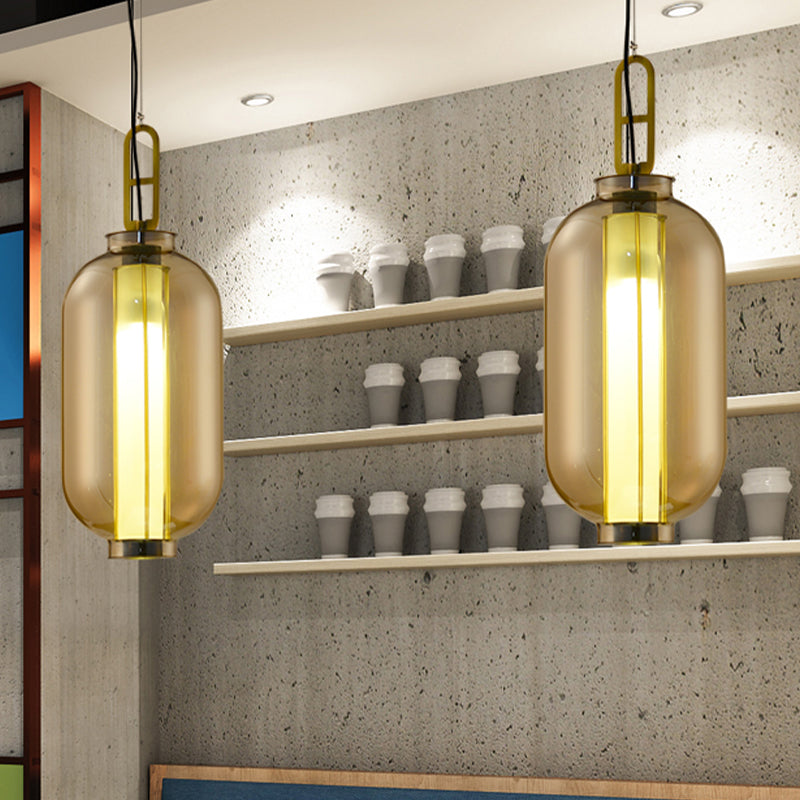 12.5"/19" H Gold Single Pendulum Light Retro Amber Glass Sphere/Ellipse/Oblong Suspension Lamp with Tube Frame Insert Clearhalo 'Ceiling Lights' 'Glass shade' 'Glass' 'Industrial Pendants' 'Industrial' 'Middle Century Pendants' 'Pendant Lights' 'Pendants' 'Tiffany' Lighting' 1457905