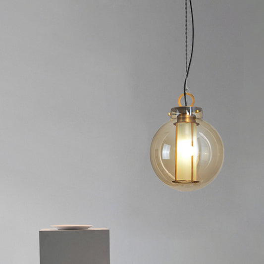 12.5"/19" H Gold Single Pendulum Light Retro Amber Glass Sphere/Ellipse/Oblong Suspension Lamp with Tube Frame Insert Amber A Clearhalo 'Ceiling Lights' 'Glass shade' 'Glass' 'Industrial Pendants' 'Industrial' 'Middle Century Pendants' 'Pendant Lights' 'Pendants' 'Tiffany' Lighting' 1457915