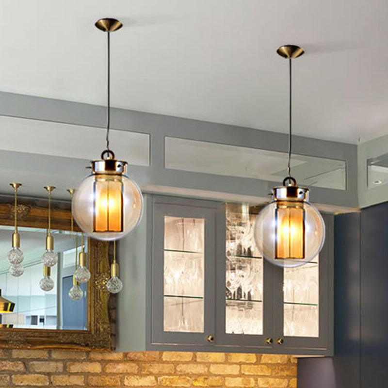 12.5"/19" H Gold Single Pendulum Light Retro Amber Glass Sphere/Ellipse/Oblong Suspension Lamp with Tube Frame Insert Clearhalo 'Ceiling Lights' 'Glass shade' 'Glass' 'Industrial Pendants' 'Industrial' 'Middle Century Pendants' 'Pendant Lights' 'Pendants' 'Tiffany' Lighting' 1457916