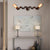 Bronze Finish Pipe Wall Lamp with Wavy Design Industrial Style Metallic 2/5 Bulbs Living Room Wall Sconce Light 2.0 Bronze Clearhalo 'Art deco wall lights' 'Cast Iron' 'Glass' 'Industrial wall lights' 'Industrial' 'Middle century wall lights' 'Modern' 'Rustic wall lights' 'Tiffany' 'Traditional wall lights' 'Wall Lamps & Sconces' 'Wall Lights' Lighting' 145818
