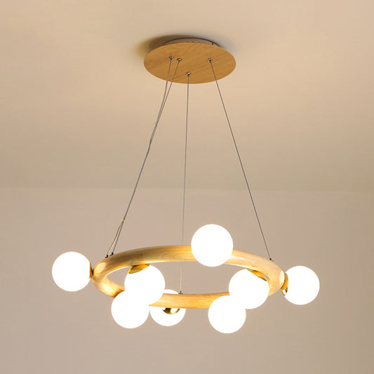 Orbs Opal Matte Glass Chandelier Nordic 8 Bulbs Beige Ceiling Pendant Light with Wood Circle Arm Clearhalo 'Carpenter Chandeliers' 'Ceiling Lights' 'Chandeliers' 'Industrial' 'Modern Chandeliers' 'Modern' Lighting' 1459391
