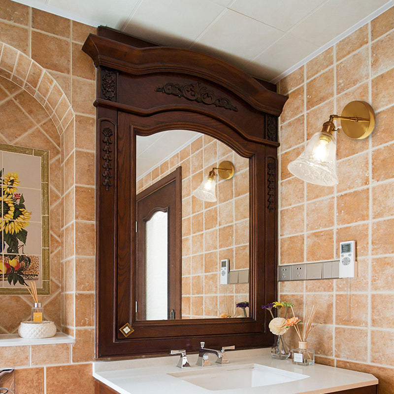 1 Light Clear Glass Wall Sconce Light Rustic Brass Bell Bedroom Lighting Fixture with Flower Clear Clearhalo 'Cast Iron' 'Glass' 'Industrial wall lights' 'Industrial' 'Middle century wall lights' 'Modern' 'Tiffany' 'Traditional wall lights' 'Wall Lamps & Sconces' 'Wall Lights' Lighting' 146641