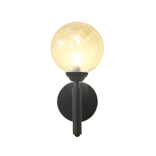 Modern Globe Wall Lighting Fixture 1 Bulb Clear Textured Glass Sconce Light in Black Clearhalo 'Cast Iron' 'Glass' 'Industrial' 'Modern wall lights' 'Modern' 'Tiffany' 'Traditional wall lights' 'Wall Lamps & Sconces' 'Wall Lights' Lighting' 146870