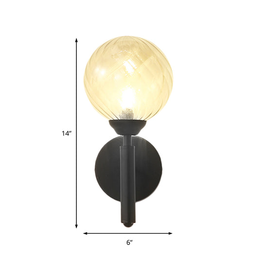 Modern Globe Wall Lighting Fixture 1 Bulb Clear Textured Glass Sconce Light in Black Clearhalo 'Cast Iron' 'Glass' 'Industrial' 'Modern wall lights' 'Modern' 'Tiffany' 'Traditional wall lights' 'Wall Lamps & Sconces' 'Wall Lights' Lighting' 146871