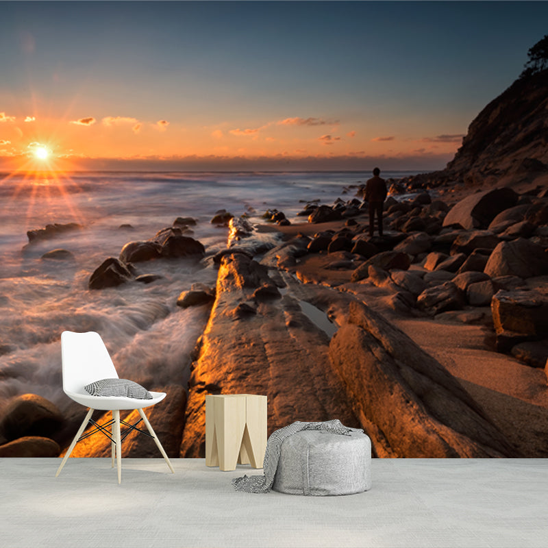 Non-Woven Washable Mural Contemporary Man in Rock Coast at Sunset Wall Decor in Yellow-Blue Clearhalo 'Wall Decor' 'Wall Mural' 1468864
