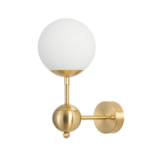 Modern Globe Wall Lighting Fixture 1 Bulb White Glass Sconce Light in Brass for Bathroom Clearhalo 'Cast Iron' 'Glass' 'Industrial' 'Modern wall lights' 'Modern' 'Tiffany' 'Traditional wall lights' 'Wall Lamps & Sconces' 'Wall Lights' Lighting' 146890