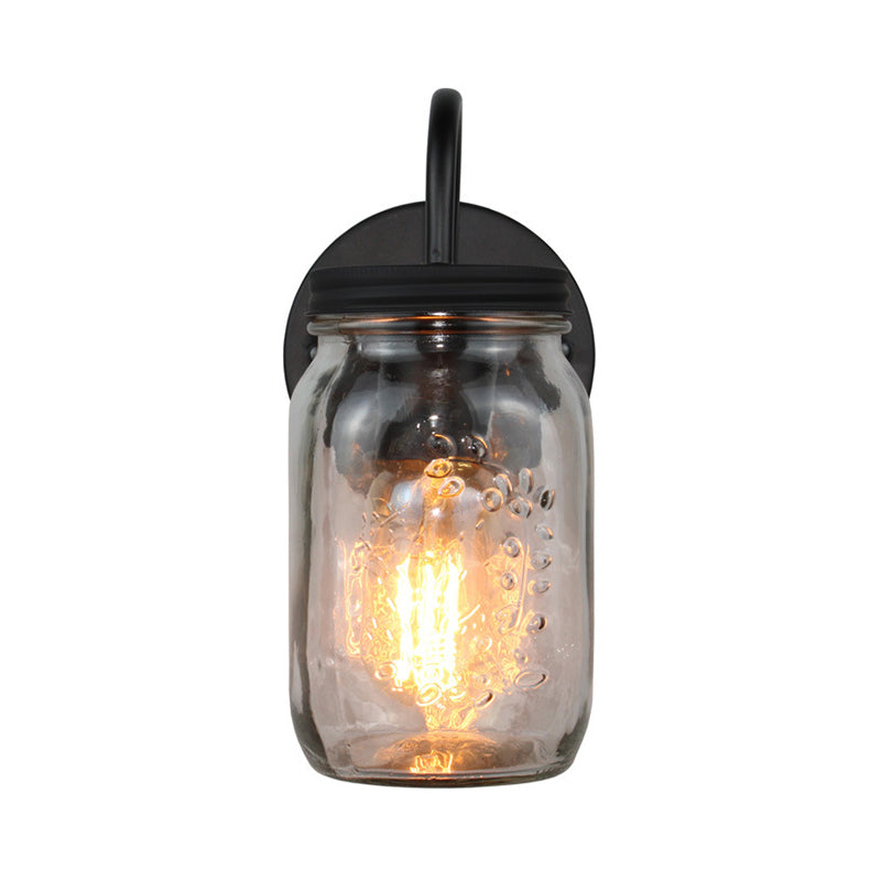 Black Jar Shade Wall Lighting Industrial Clear Glass 1 Light Bedroom Sconce Light Fixture with Flower Grain Clearhalo 'Cast Iron' 'Glass' 'Industrial' 'Modern wall lights' 'Modern' 'Tiffany' 'Traditional wall lights' 'Wall Lamps & Sconces' 'Wall Lights' Lighting' 146994