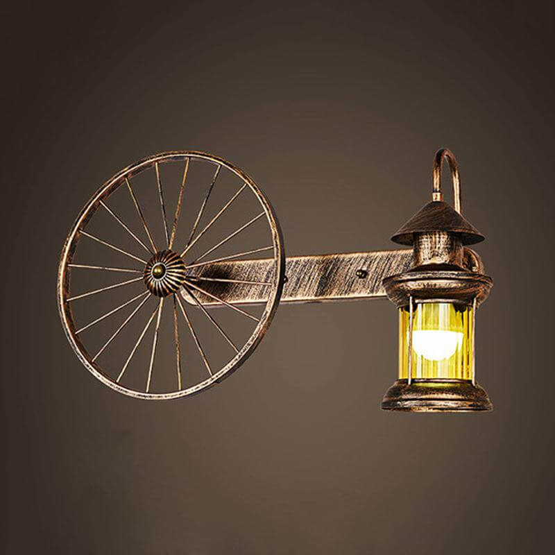 1 Bulb Amber Glass Sconce Coastal Brass Lantern Corner Wall Mounted Light with Wagon Wheel Deco Clearhalo 'Art deco wall lights' 'Cast Iron' 'Glass' 'Industrial wall lights' 'Industrial' 'Middle century wall lights' 'Modern' 'Rustic wall lights' 'Tiffany' 'Traditional wall lights' 'Wall Lamps & Sconces' 'Wall Lights' Lighting' 1473058-sw