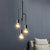 Iron Black Chandelier Pendant Light Bare Bulb 3 Heads Industrial Hanging Lamp for Living Room Black Clearhalo 'Cast Iron' 'Ceiling Lights' 'Chandeliers' 'Industrial Chandeliers' 'Industrial' 'Metal' 'Middle Century Chandeliers' 'Rustic Chandeliers' 'Tiffany' Lighting' 1473932