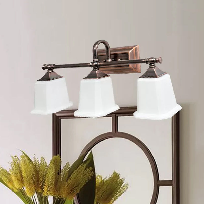 Copper 2/3-Head Vanity Light Fixture Traditional Ivory Glass Trapezoid Wall Lighting with Twist Arm for Bathroom Clearhalo 'Vanity Lights' 'Wall Lights' Lighting' 1475663