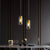 Mid Century Single Hanging Pendant Smoke Grey Glass Black Small Bottle Suspended Lighting Fixture Black Clearhalo 'Ceiling Lights' 'Glass shade' 'Glass' 'Modern Pendants' 'Modern' 'Pendant Lights' 'Pendants' Lighting' 1475879