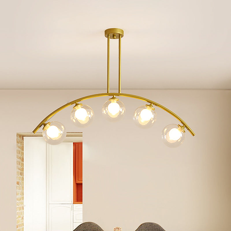 White/Clear Glass Orb Island Lamp Modernist 5 Bulbs Pendant Lighting with Brass Arch Arm for Dining Room Clearhalo 'Ceiling Lights' 'Chandeliers' 'Close To Ceiling Lights' 'Glass shade' 'Glass' 'Island Lights' Lighting' 1476085