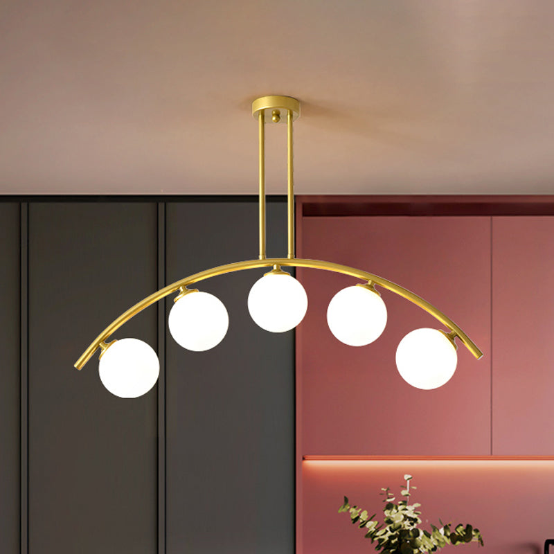 White/Clear Glass Orb Island Lamp Modernist 5 Bulbs Pendant Lighting with Brass Arch Arm for Dining Room Clearhalo 'Ceiling Lights' 'Chandeliers' 'Close To Ceiling Lights' 'Glass shade' 'Glass' 'Island Lights' Lighting' 1476090
