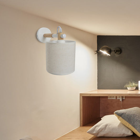 Fabric Cylindrical Sconce Wall Light Modernist 1 Light Bedroom Wall Mount Fixture with Wooden Joint in Black/White White Clearhalo 'Industrial wall lights' 'Industrial' 'Middle century wall lights' 'Rustic wall lights' 'Tiffany' 'Wall Lamps & Sconces' 'Wall Lights' Lighting' 147611