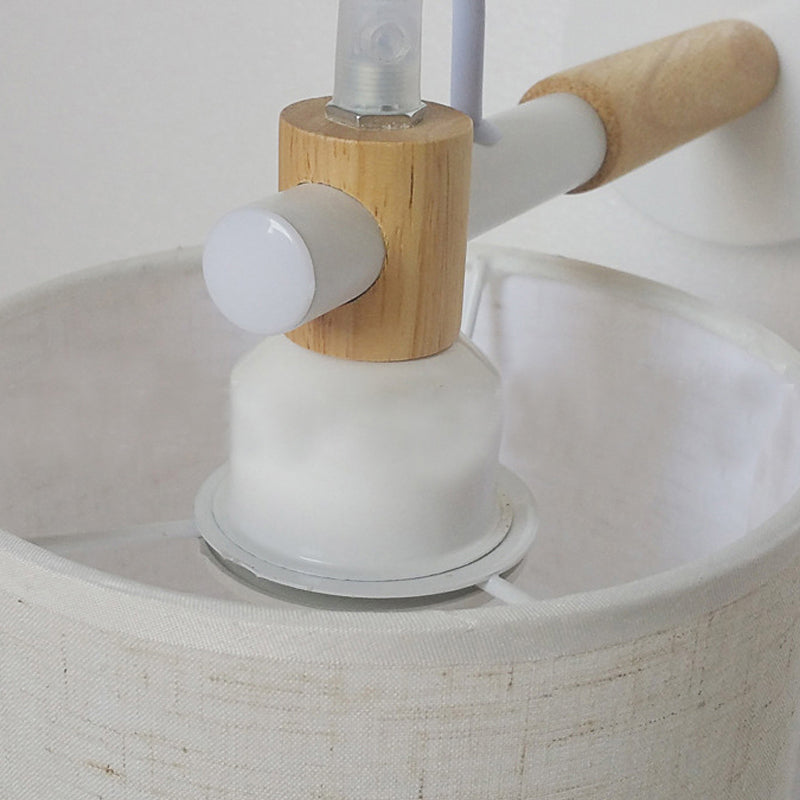 Fabric Cylindrical Sconce Wall Light Modernist 1 Light Bedroom Wall Mount Fixture with Wooden Joint in Black/White Clearhalo 'Industrial wall lights' 'Industrial' 'Middle century wall lights' 'Rustic wall lights' 'Tiffany' 'Wall Lamps & Sconces' 'Wall Lights' Lighting' 147614