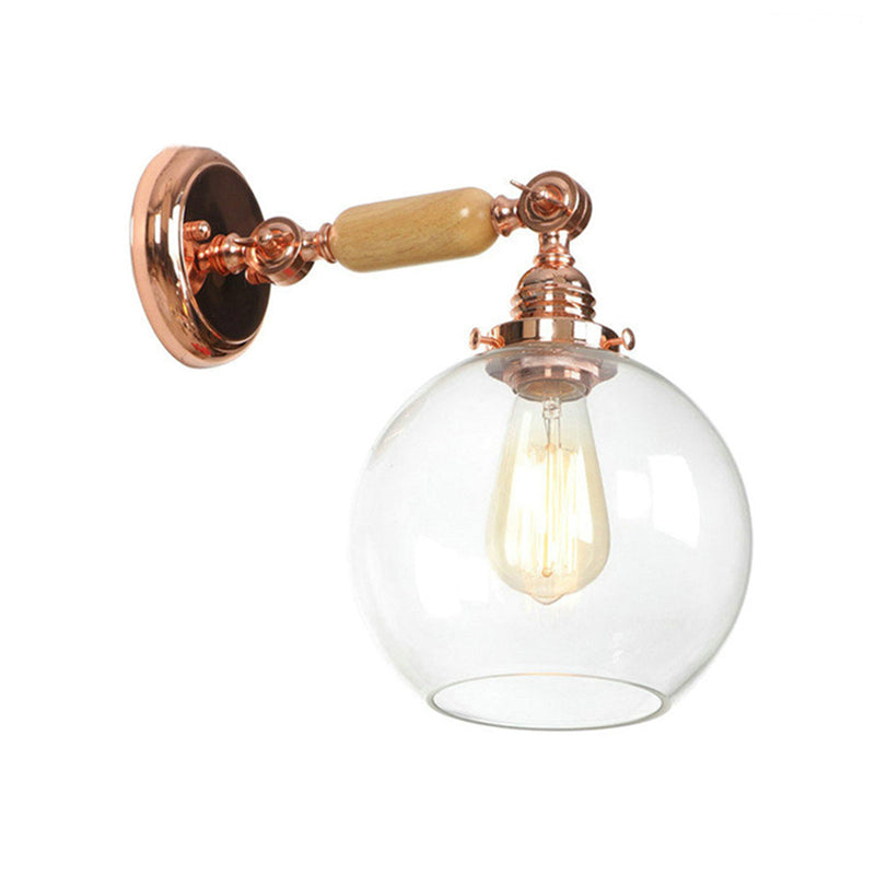 Orb Shade Clear Glass Wall Mounted Lamp Industrial Single Bulb Living Room Sconce Light in Rose Gold Clearhalo 'Cast Iron' 'Glass' 'Industrial wall lights' 'Industrial' 'Middle century wall lights' 'Modern' 'Tiffany' 'Traditional wall lights' 'Wall Lamps & Sconces' 'Wall Lights' Lighting' 148133