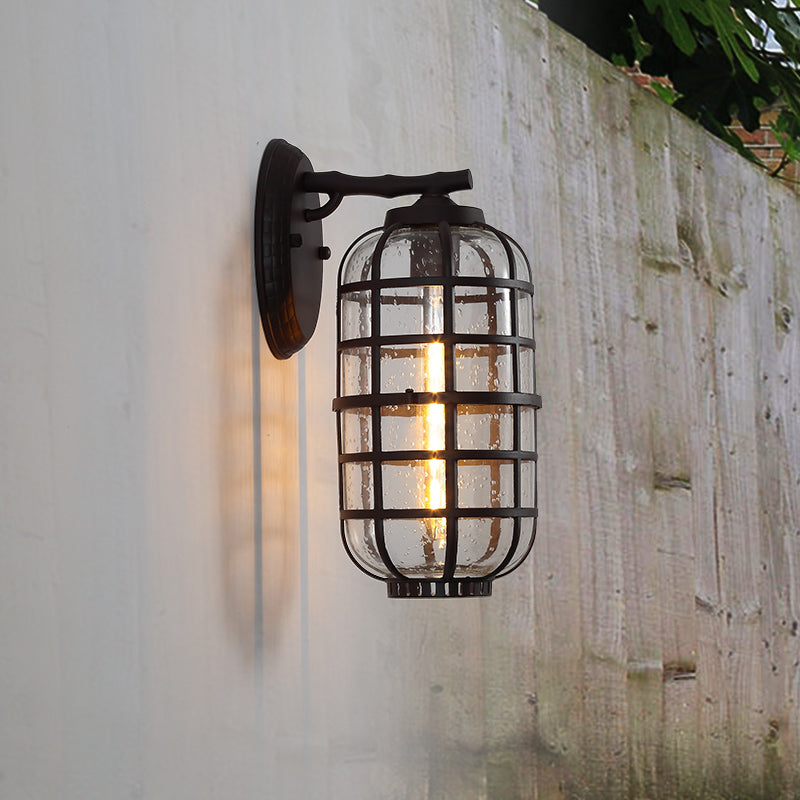 Caged Seedy Glass Wall Mounted Lamp Industrial Single Bulb Outdoor Sconce Light in Black/Bronze, 5.5"/6"/8" Wide Clearhalo 'Art deco wall lights' 'Cast Iron' 'Glass' 'Industrial wall lights' 'Industrial' 'Middle century wall lights' 'Modern' 'Rustic wall lights' 'Tiffany' 'Traditional wall lights' 'Wall Lamps & Sconces' 'Wall Lights' Lighting' 149927