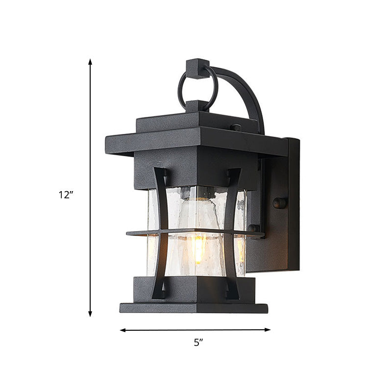 Clear Glass Black Sconce Light Square/Rectangle 1-Light Coastal Wall Lamp Fixture with Iron Cage Clearhalo 'Art deco wall lights' 'Cast Iron' 'Glass' 'Industrial wall lights' 'Industrial' 'Middle century wall lights' 'Modern' 'Rustic wall lights' 'Tiffany' 'Traditional wall lights' 'Wall Lamps & Sconces' 'Wall Lights' Lighting' 149968