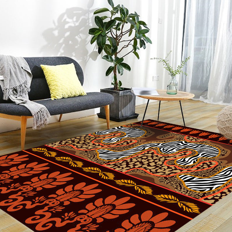 Paisley and Leopard Tribal Rug in Orange Indian Americana Scroll Synthetic Floor Covering Pet Friendly Stain Resistant Indoor Rug Clearhalo 'Area Rug' 'Rugs' 'Southwestern' Rug' 1504256