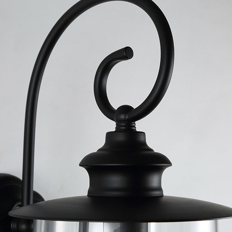 Urn Shade Clear Glass Wall Mounted Lamp Industrial Single Bulb Outdoor Sconce Light with Curved Arm Clearhalo 'Art deco wall lights' 'Cast Iron' 'Glass' 'Industrial wall lights' 'Industrial' 'Middle century wall lights' 'Modern' 'Rustic wall lights' 'Tiffany' 'Traditional wall lights' 'Wall Lamps & Sconces' 'Wall Lights' Lighting' 150515