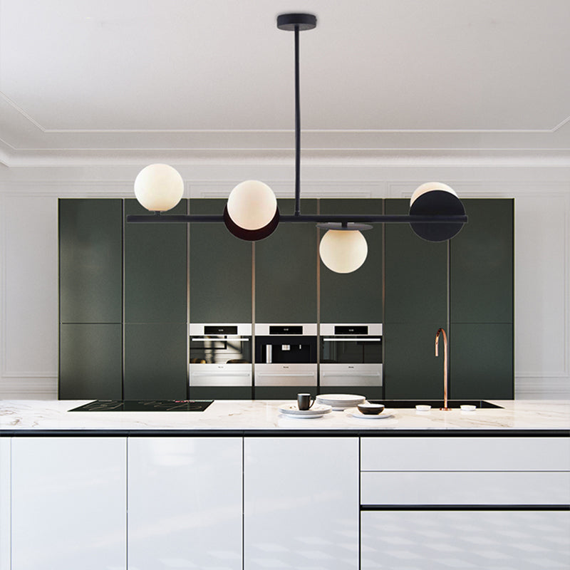 4-Light Ball Island Pendant Contemporary Matte White Glass Ceiling Light in White/Black with Adjustable Rod Black Clearhalo 'Ceiling Lights' 'Chandeliers' 'Glass shade' 'Glass' 'Island Lights' Lighting' 150896