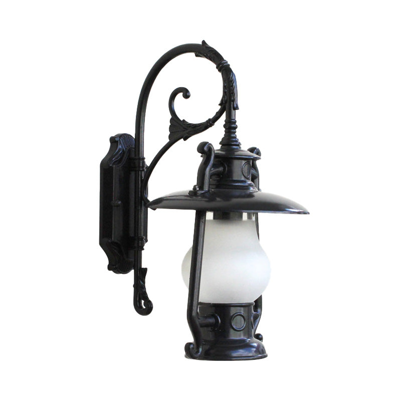Lantern Frosted Glass Wall Mounted Lamp Coastal Single Bulb Outdoor Sconce Light in Black/Aged Brass Clearhalo 'Art deco wall lights' 'Cast Iron' 'Glass' 'Industrial wall lights' 'Industrial' 'Middle century wall lights' 'Modern' 'Rustic wall lights' 'Tiffany' 'Traditional wall lights' 'Wall Lamps & Sconces' 'Wall Lights' Lighting' 151013