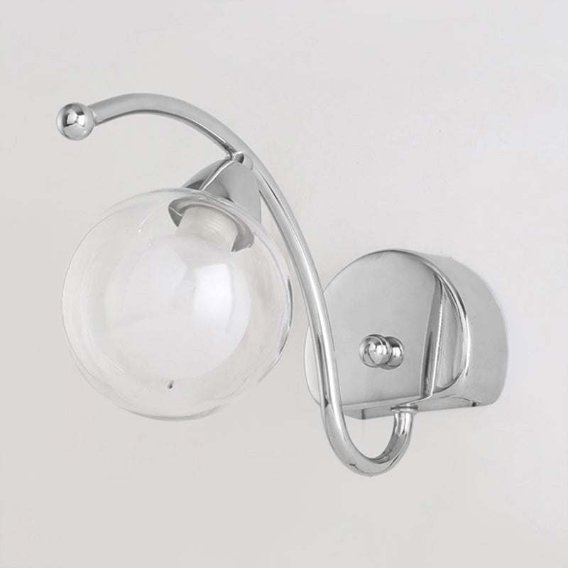 Modern Globe Wall Lamp Clear Glass 1 Light Bedroom Led Wall Light Sconce in Chrome with Curved Arm Clearhalo 'Cast Iron' 'Glass' 'Industrial' 'Modern wall lights' 'Modern' 'Tiffany' 'Traditional wall lights' 'Wall Lamps & Sconces' 'Wall Lights' Lighting' 1523257