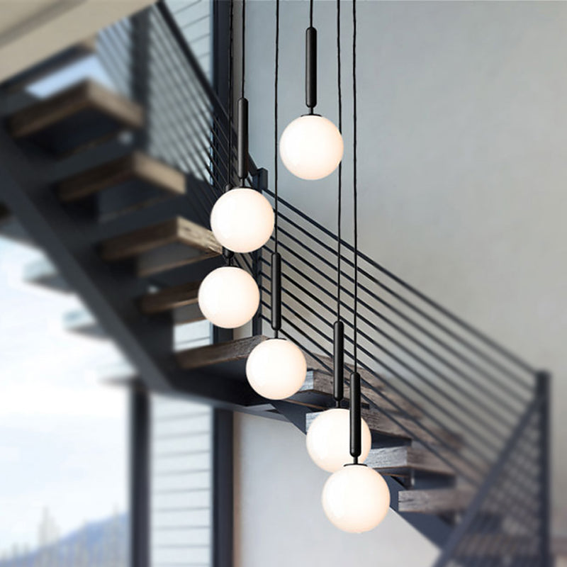 Spherical White Glass Suspension Pendant Modernist 1 Light 6"/8"/10" Wide Black/Gold Hanging Light Fixture Clearhalo 'Ceiling Lights' 'Glass shade' 'Glass' 'Island Lights' 'Modern Pendants' 'Modern' 'Pendant Lights' 'Pendants' Lighting' 1523694