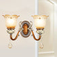 Lodge Style Flower Wall Lamp Frosted Glass 1/2-Bulb Sconce Lighting with Teardrop Crystal Deco and Metal Arm in Gold 2.0 Gold Clearhalo 'Wall Lamps & Sconces' 'Wall Lights' Lighting' 153204