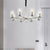 Clear Glass Candle Chandelier Modernism 6 Heads Chrome Ceiling Pendant Fixture with Adjustable Chain Chrome Clearhalo 'Ceiling Lights' 'Chandeliers' 'Glass shade' 'Glass' 'Island Lights' 'Modern Chandeliers' 'Modern' Lighting' 156038