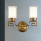 2 Bulbs Wall Sconce Light Traditional Dual Cylinder Clear and White Glass Wall Mount Lighting in Brass Clearhalo 'Wall Lamps & Sconces' 'Wall Lights' Lighting' 1580642