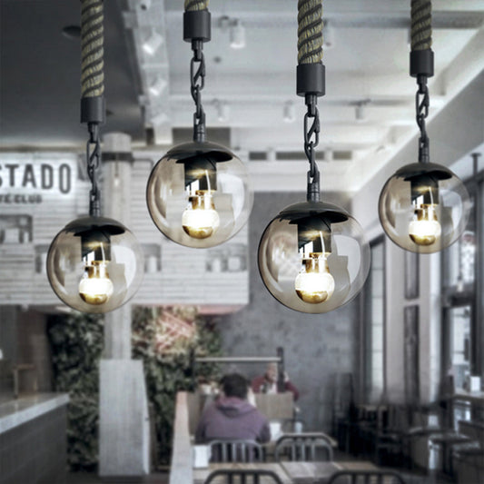 1 Light Tan Glass Pendant Light Lodge Stylish Black Finish Ball Restaurant Hanging Light with Rope Black Clearhalo 'Ceiling Lights' 'Glass shade' 'Glass' 'Industrial Pendants' 'Industrial' 'Middle Century Pendants' 'Pendant Lights' 'Pendants' 'Tiffany' Lighting' 158810