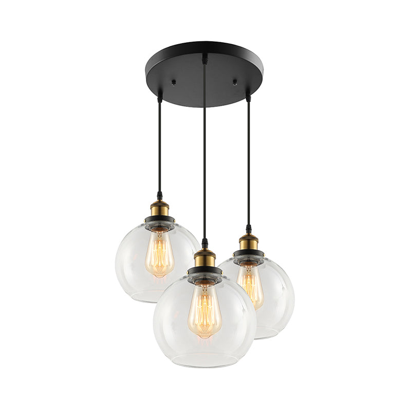 3/4-Light Clear Glass Multi Hanging Light Fixture Industrial Antique Brass Orb Living Room Pendant with Round Canopy Clearhalo 'Ceiling Lights' 'Glass shade' 'Glass' 'Industrial Pendants' 'Industrial' 'Middle Century Pendants' 'Pendant Lights' 'Pendants' 'Tiffany' Lighting' 159514
